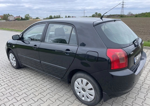 Toyota Corolla cena 7900 przebieg: 205133, rok produkcji 2003 z Warszawa małe 92